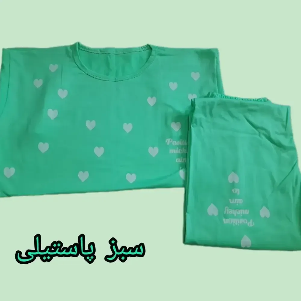 ست تیشرت و شلوار زنانه راحتی طرح قلب جنس نخ ویسکوز فول کش سایز 38 تا 48